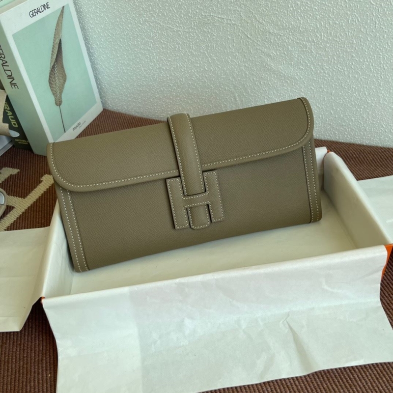 H**mes clutch bags